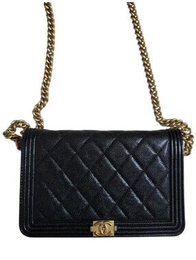 Authentic mini Chanel Boy Bag black caviar—excellent condition
